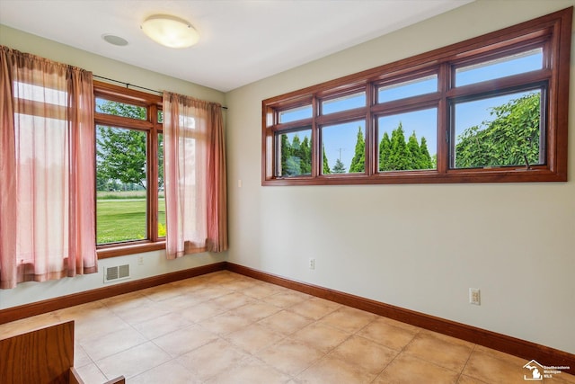 8650 Stone Rd, Maybee, MI 48159 - spare room with baseboards