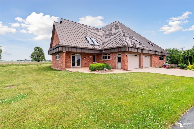 8650 Stone Rd, Maybee, MI 48159 - view of front of house with a standing seam roof, brick siding, driveway, an attached garage, and a front yard