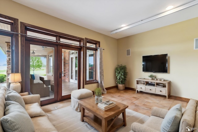 8650 Stone Rd, Maybee, MI 48159 - living room with french doors and recessed lighting