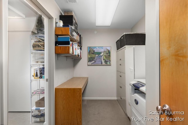 spacious closet with carpet floors