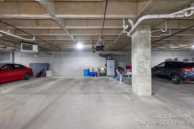 parking deck featuring concrete block wall