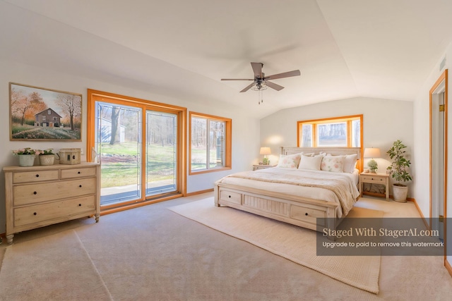 bedroom with vaulted ceiling, carpet flooring, access to outside, and ceiling fan