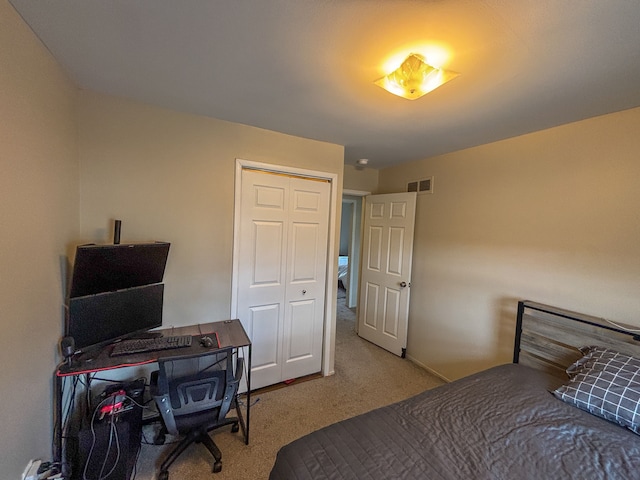 bedroom featuring carpet flooring and visible vents