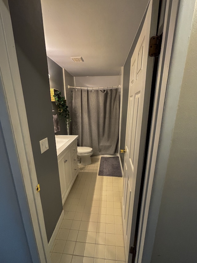 full bath with toilet, vanity, visible vents, tile patterned floors, and a shower with shower curtain