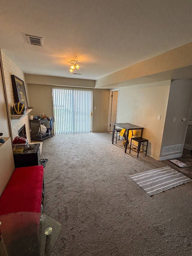 carpeted living room featuring visible vents