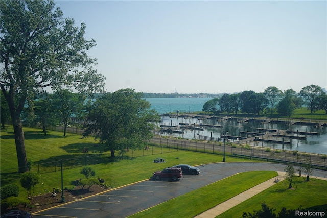 8900 E Jefferson Ave Unit 420 421, Detroit, MI 48214 - surrounding community featuring a water view, uncovered parking, a boat dock, and boat lift