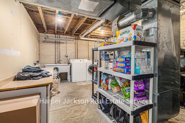 unfinished basement featuring washer and dryer