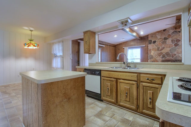kitchen featuring light countertops, white appliances, lofted ceiling with beams, a kitchen island, and a sink