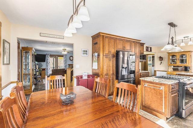 10541 S Jackson Rd, Cement City, MI 49233 - dining space featuring a ceiling fan