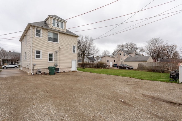 880 White Ave, Lincoln Park, MI 48146 - exterior space featuring a yard and fence