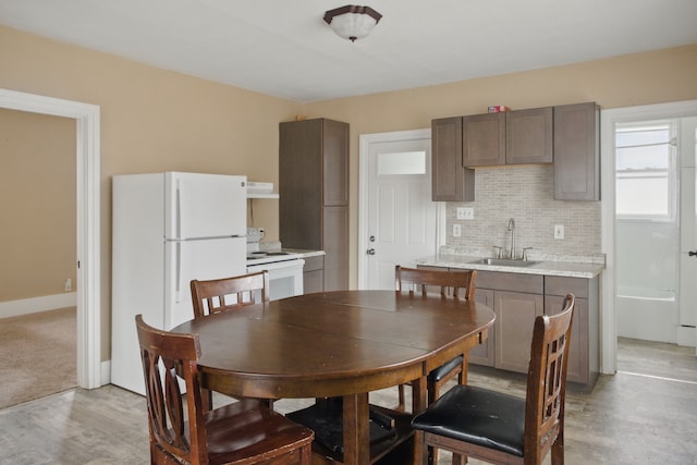 880 White Ave, Lincoln Park, MI 48146 - dining room with light wood-type flooring and baseboards