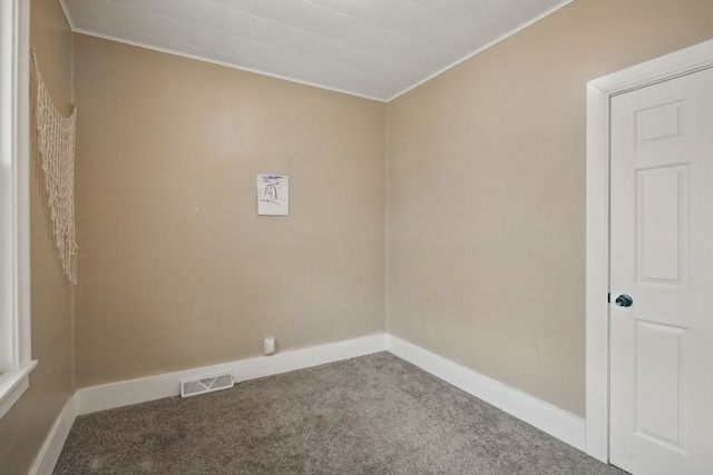 880 White Ave, Lincoln Park, MI 48146 - carpeted empty room featuring visible vents and baseboards