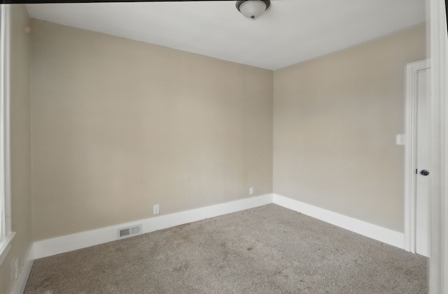 880 White Ave, Lincoln Park, MI 48146 - carpeted spare room with baseboards and visible vents