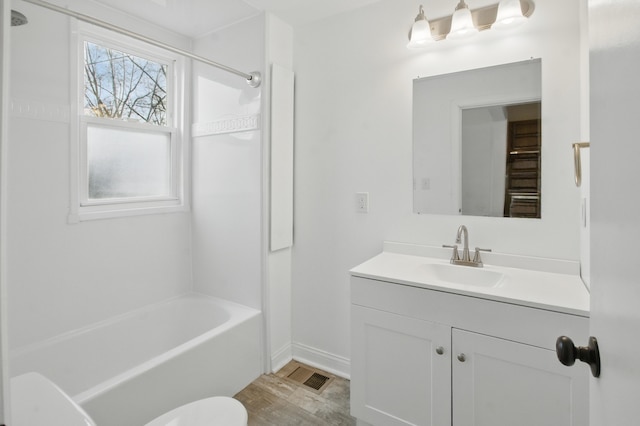 880 White Ave, Lincoln Park, MI 48146 - bathroom with vanity, visible vents,  shower combination, toilet, and wood finished floors