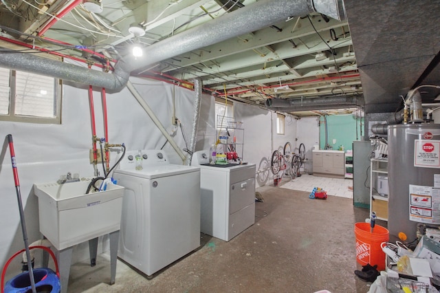 880 White Ave, Lincoln Park, MI 48146 - basement featuring water heater, independent washer and dryer, and a sink