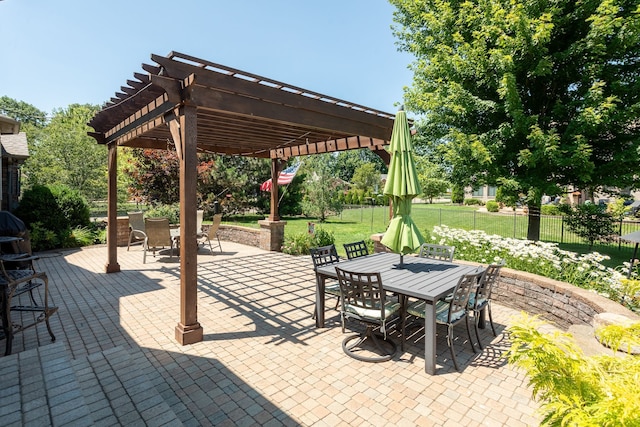 view of patio / terrace featuring a pergola, outdoor dining area, and fence