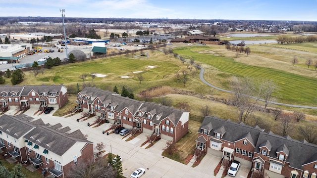 bird's eye view with view of golf course, a residential view, and a water view