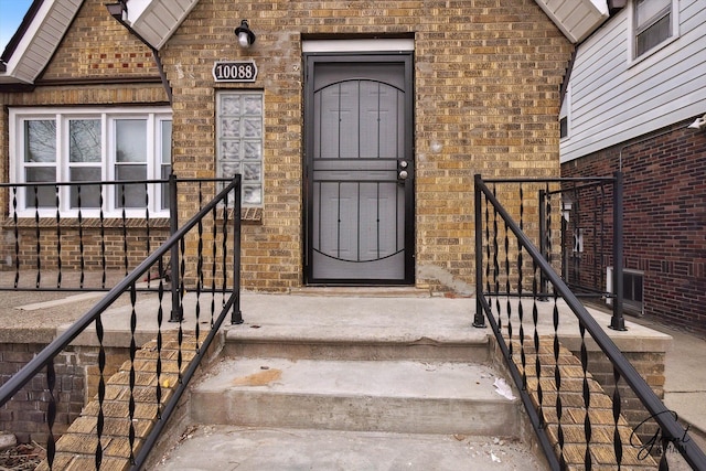 10088 Britain St, Detroit, MI 48224 - property entrance with brick siding