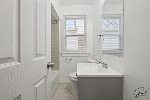 10088 Britain St, Detroit, MI 48224 - full bathroom with baseboards, toilet, and vanity