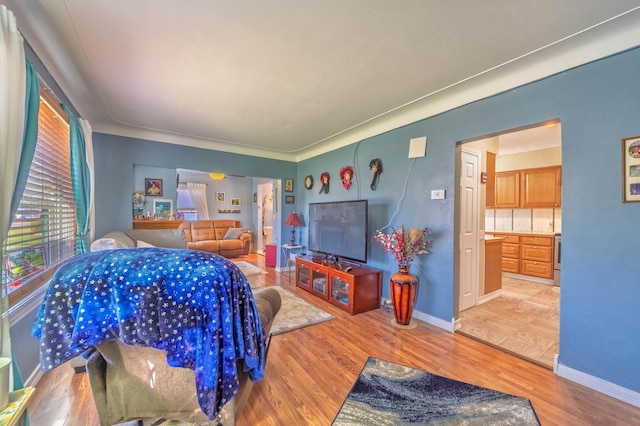 3803 Miller Rd, Kalamazoo, MI 49001 - bedroom featuring light wood-type flooring and baseboards