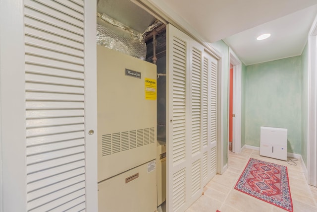 3803 Miller Rd, Kalamazoo, MI 49001 - hallway with light tile patterned floors, baseboards, a heating unit, and recessed lighting