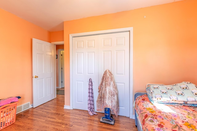 3803 Miller Rd, Kalamazoo, MI 49001 - bedroom featuring wood finished floors, baseboards, and a closet