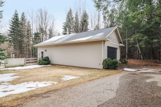 garage featuring fence
