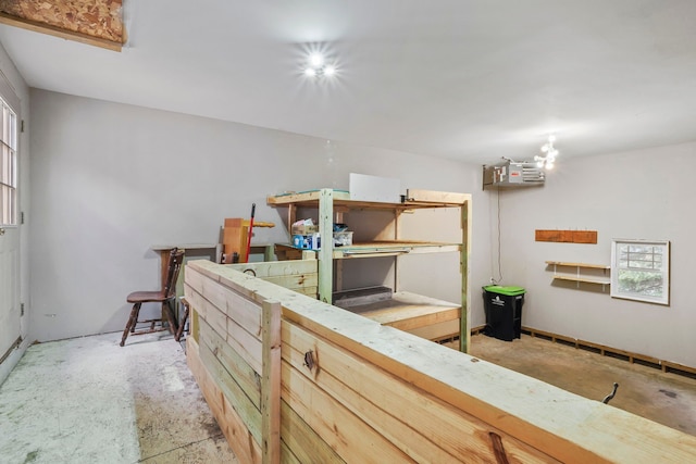 interior space featuring unfinished concrete floors