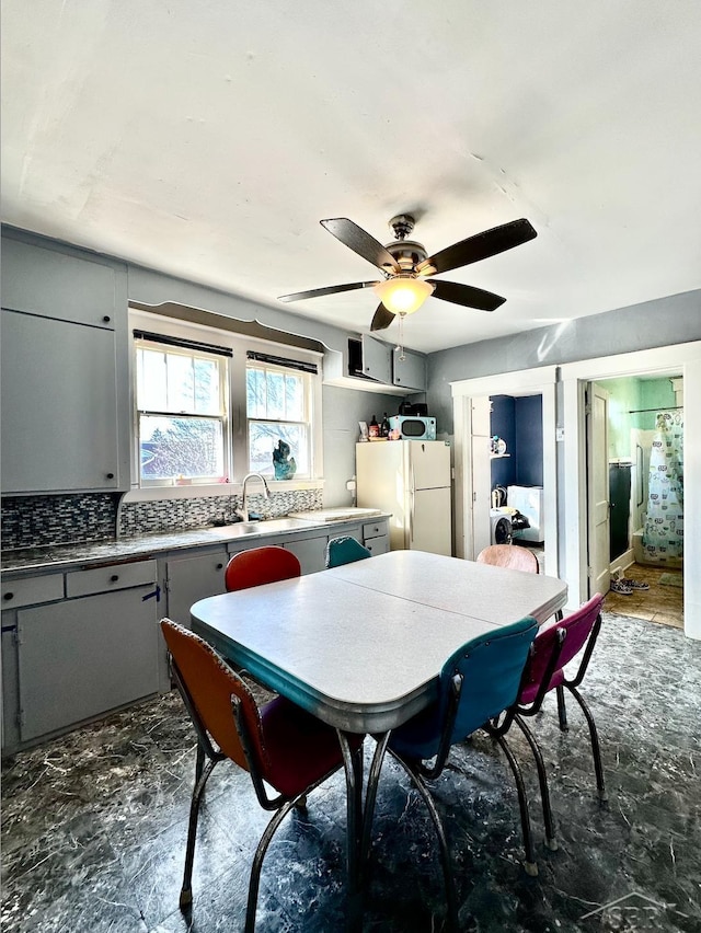 639 N Center St, Sebewaing, MI 48759 - dining area with ceiling fan