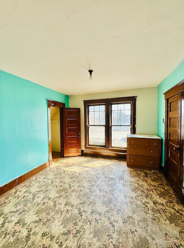 639 N Center St, Sebewaing, MI 48759 - interior space featuring baseboards, carpet, and a closet
