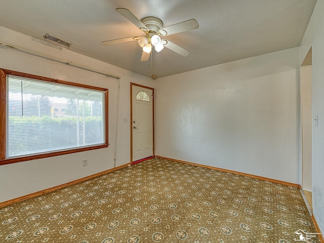 20212 Northline Rd, Taylor, MI 48180 - spare room featuring a ceiling fan and baseboards