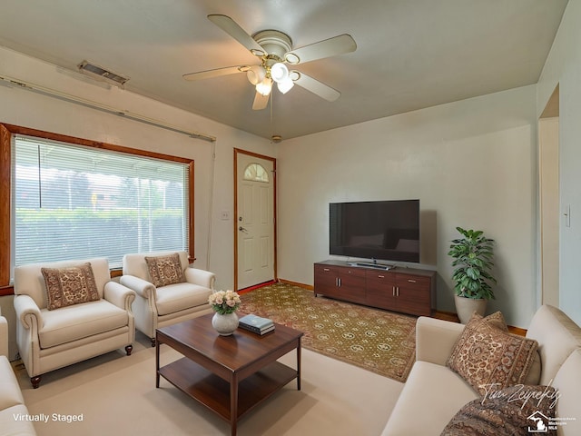 20212 Northline Rd, Taylor, MI 48180 - living area with a ceiling fan, light colored carpet, and baseboards