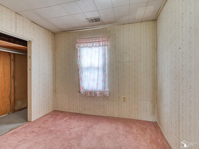 20212 Northline Rd, Taylor, MI 48180 - unfurnished bedroom featuring carpet flooring and wallpapered walls