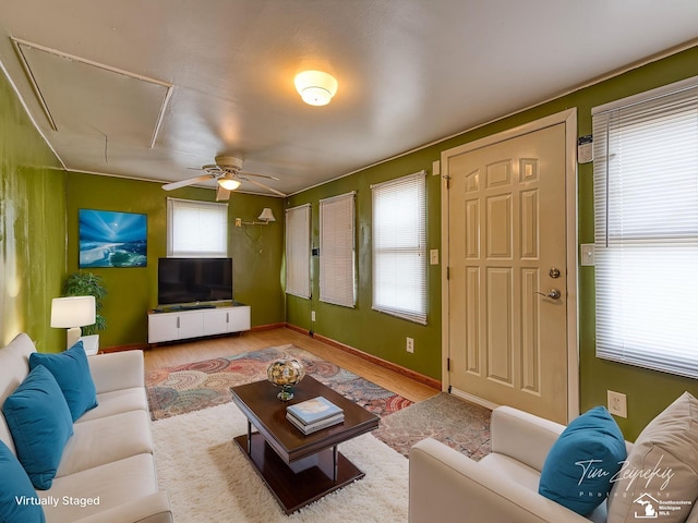 20212 Northline Rd, Taylor, MI 48180 - living area with attic access, wood finished floors, ceiling fan, and baseboards