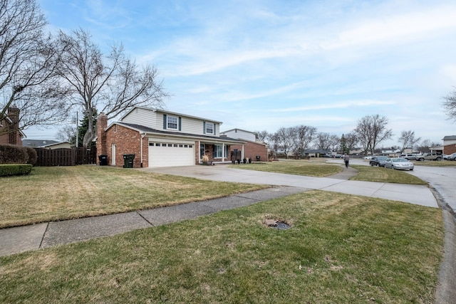 traditional-style house featuring driveway, a chimney, brick siding, a front lawn, and a garage