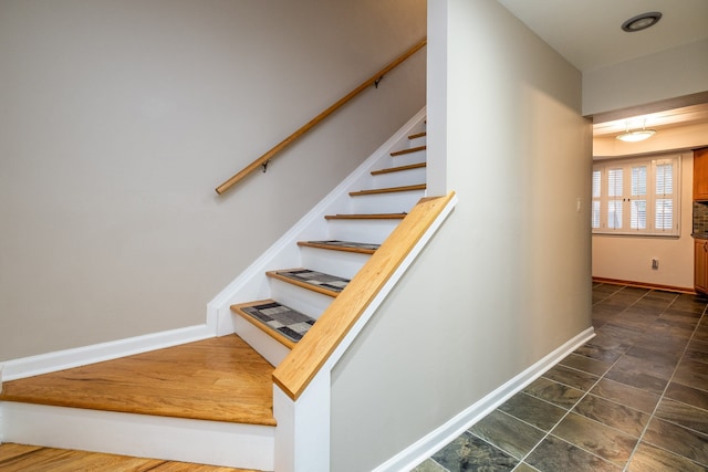 staircase with baseboards