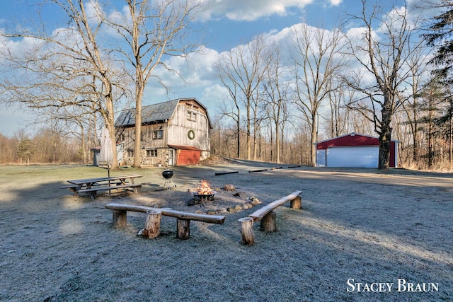 2620 36th St, Allegan, MI 49010 - view of home's community featuring driveway, an outbuilding, a garage, and a barn