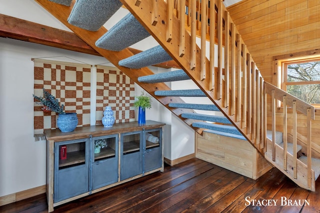 2620 36th St, Allegan, MI 49010 - stairs with baseboards, vaulted ceiling, and wood-type flooring
