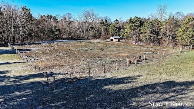 2620 36th St, Allegan, MI 49010 - view of community with an outdoor structure, a forest view, and a rural view