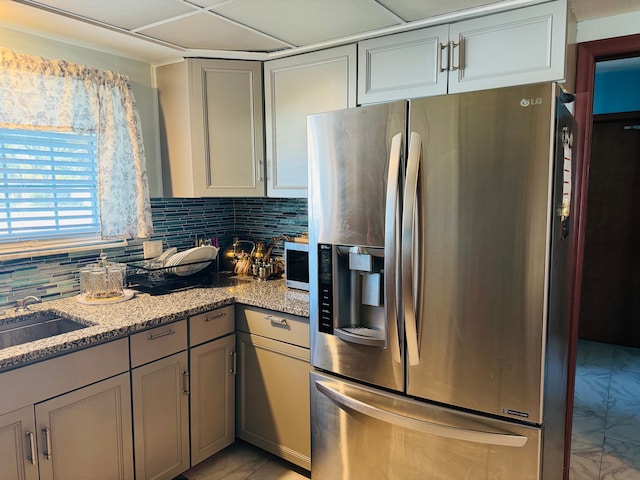 30347 Dell Ln, Warren, MI 48092 - kitchen with stainless steel fridge, gray cabinetry, light marble finish floors, and backsplash