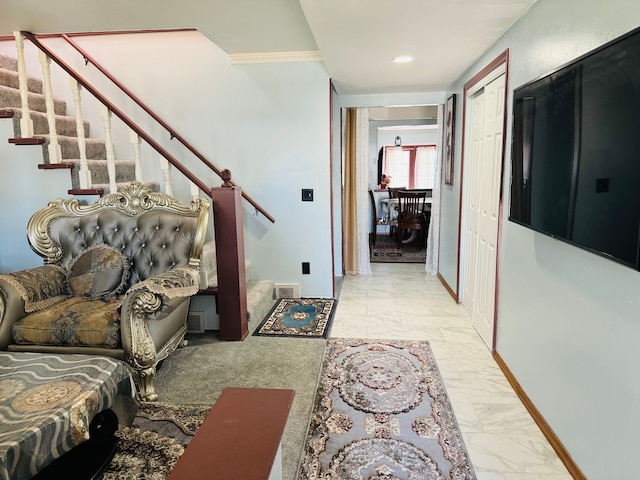 30347 Dell Ln, Warren, MI 48092 - hall with marble look tile flooring, stairway, baseboards, and crown molding