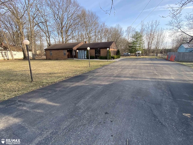 6007 Corunna Rd, Flint, MI 48532 - single story home featuring brick siding