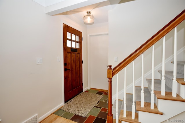 4121 S Fulton Pl, Royal Oak, MI 48073 - foyer featuring baseboards and stairs