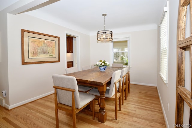 4121 S Fulton Pl, Royal Oak, MI 48073 - dining space with light wood finished floors and a chandelier