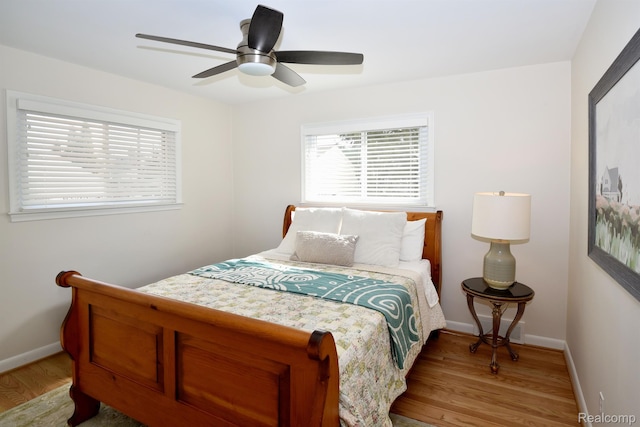 4121 S Fulton Pl, Royal Oak, MI 48073 - bedroom featuring light wood-style flooring and a ceiling fan