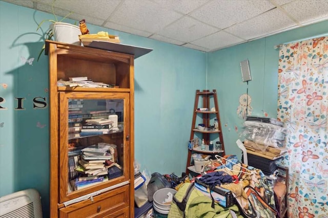 bedroom with a drop ceiling