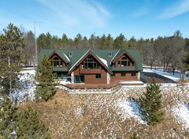 rear view of house with a deck