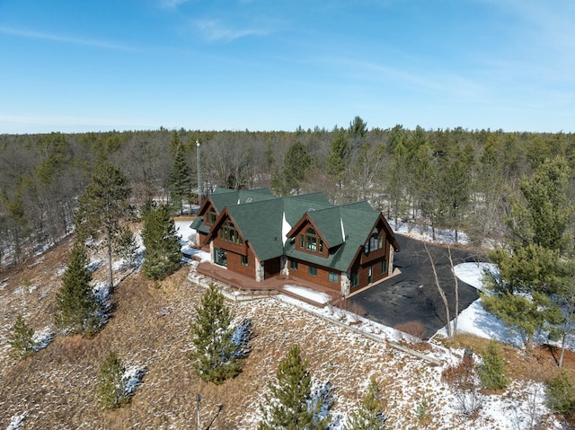 aerial view with a wooded view