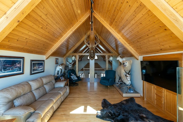 living room featuring vaulted ceiling with beams, wood finished floors, and wooden ceiling