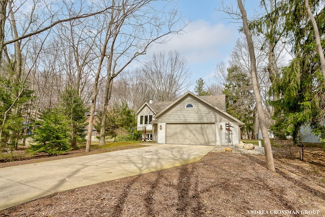 view of front of house with driveway and a garage